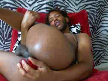 Black Faggot Fucking His Butt With Red Toy On Cam