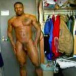 Muscular Ebony Jock Poses Naked In Messy Bedroom